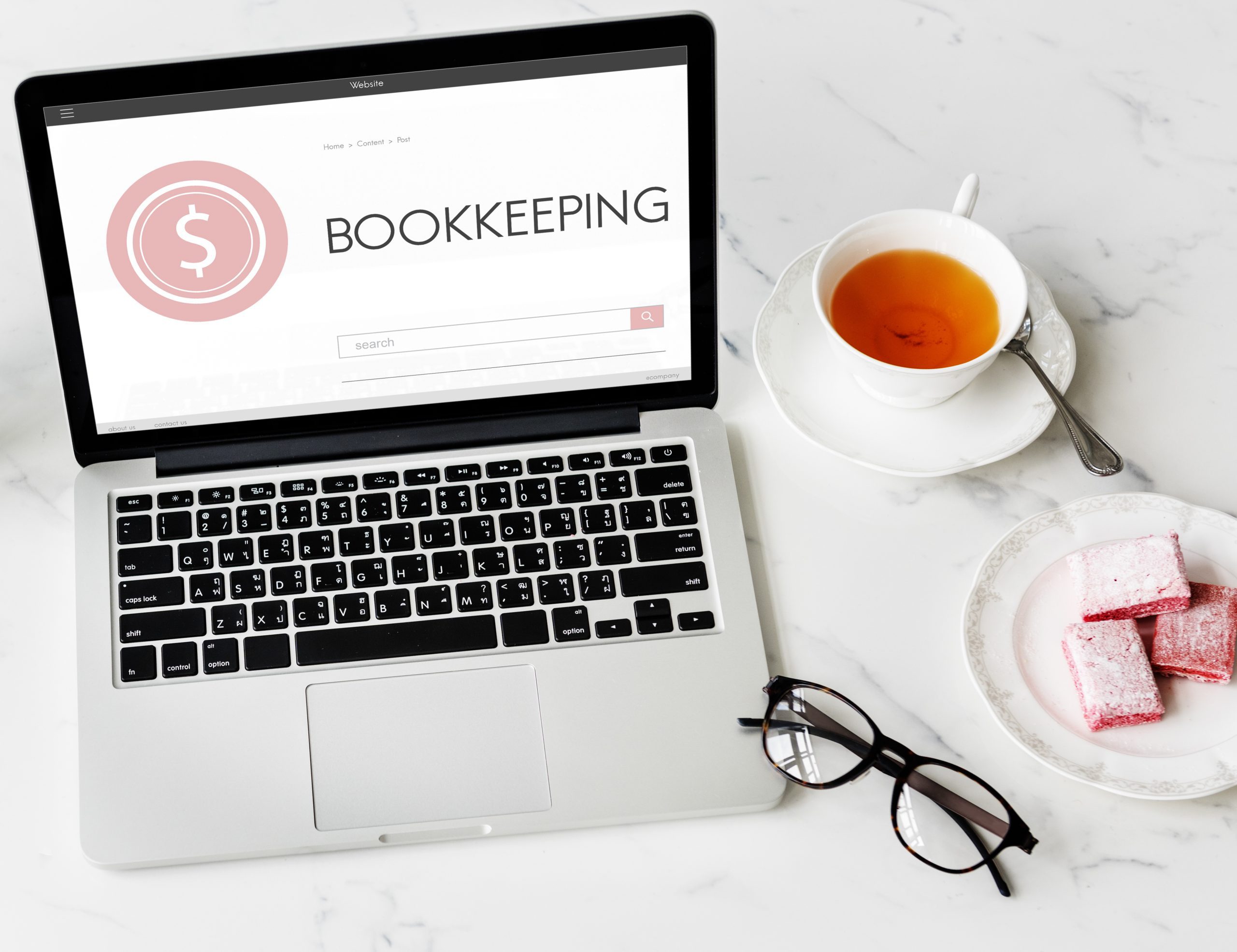 A photo that illustrates bookeeping services. In this article we explain how bookeeping companies can build high converting sales funnels and marketing strategies to get more leads and sell their services to more clients